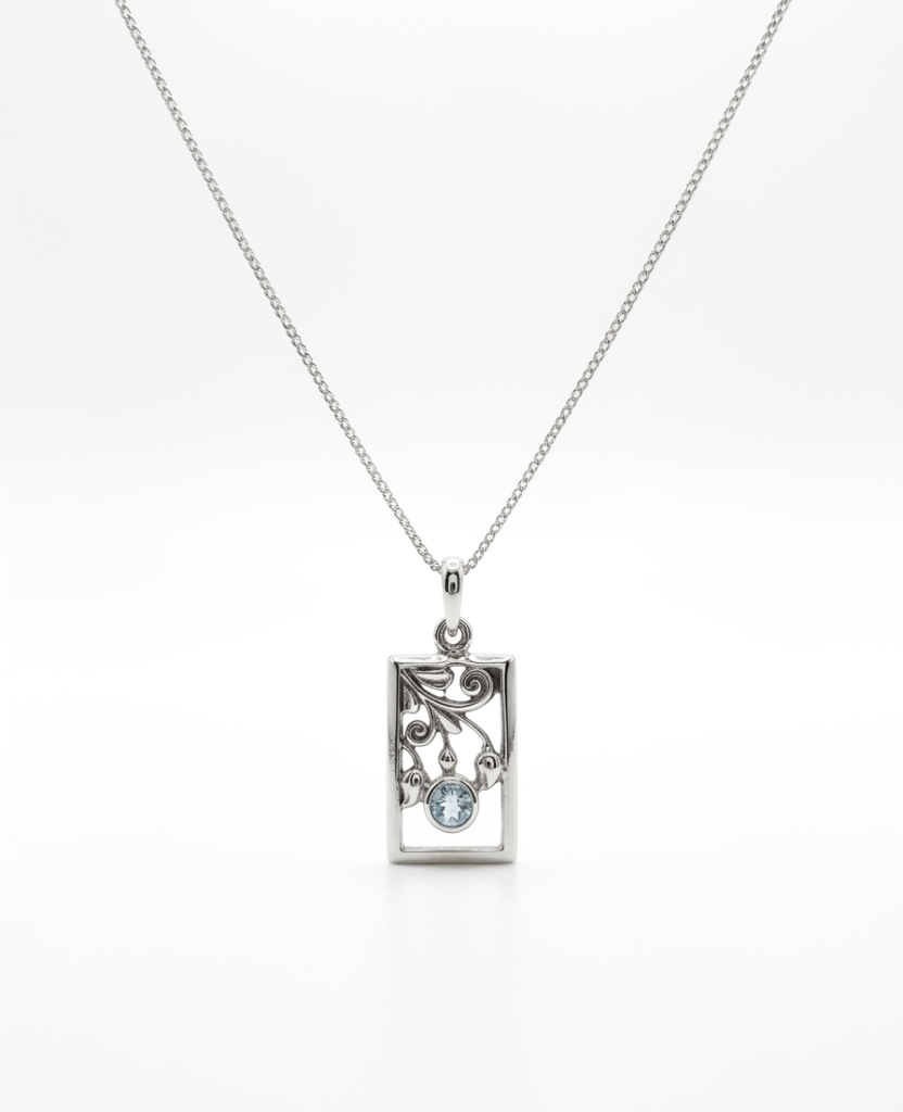 Small Sized Floral Design Silver Pendant with Aquamarine Stone