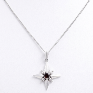 Minimalist Silver Compass Pendant with Round Cut Garnet Stone