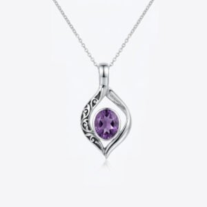 Sterling Silver Pendent with hand carved design with Amethyst