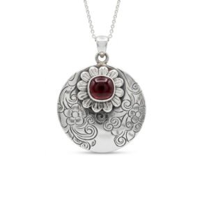 Sterling Silver Pendent with hand carved floral design with garnet
